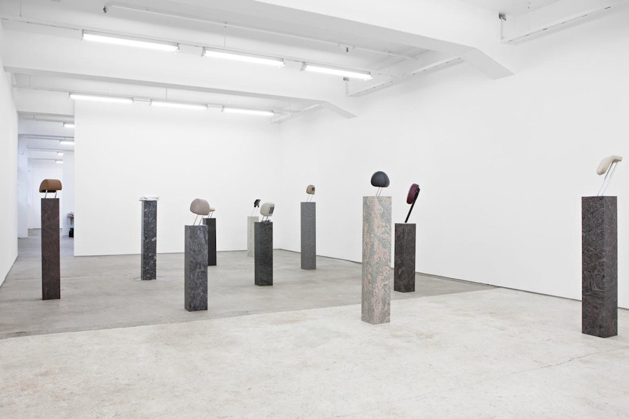 'Real Estate, 2013. Head rest, synthetic leather, aluminium and granite. Courtesy of the artist and S